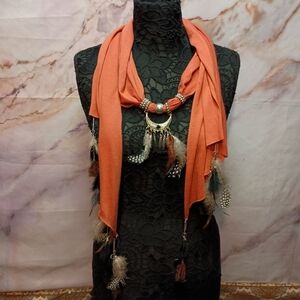 Elegant Orange Scarf with Feather Accents